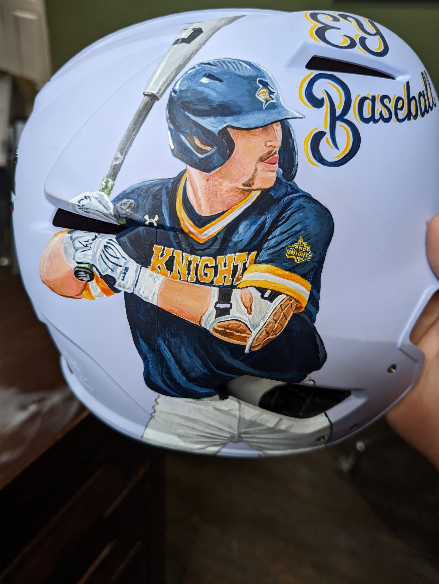 Custom hand painted portrait balls and helmets