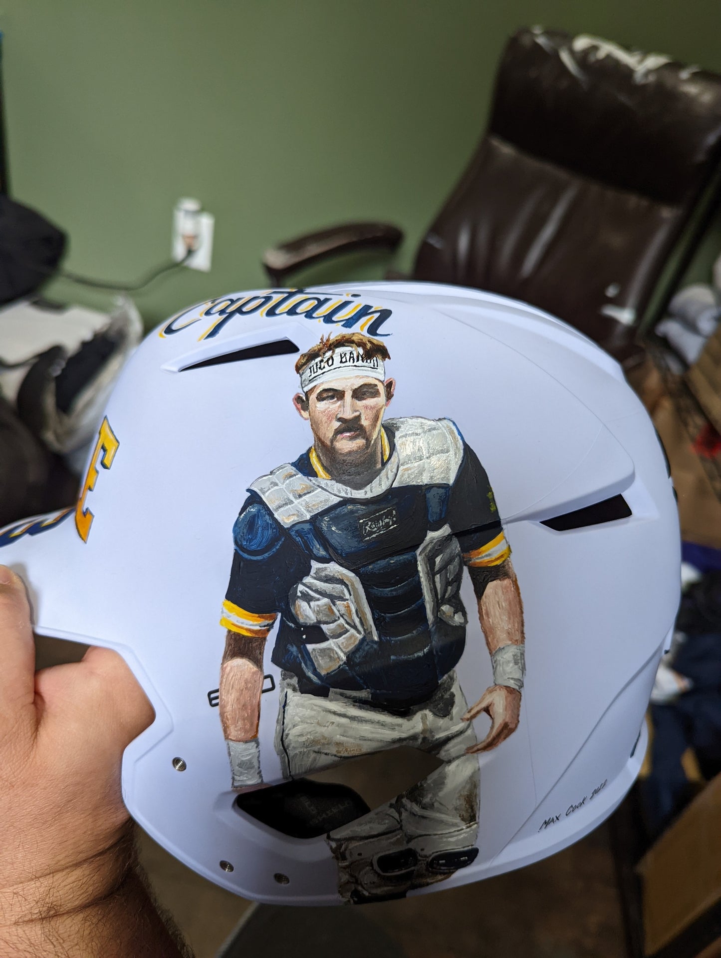 Custom hand painted portrait balls and helmets