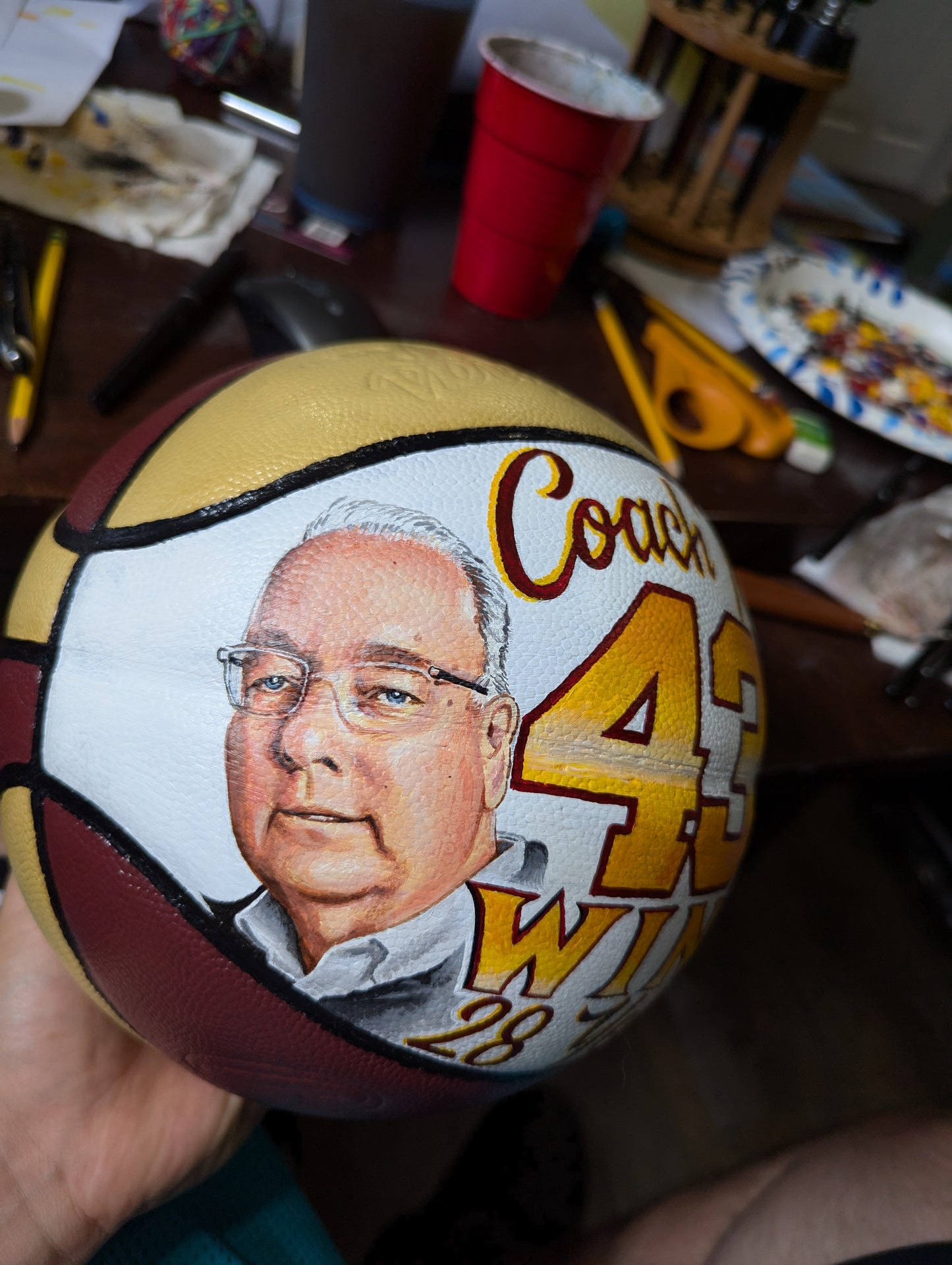 Custom hand painted portrait balls and helmets